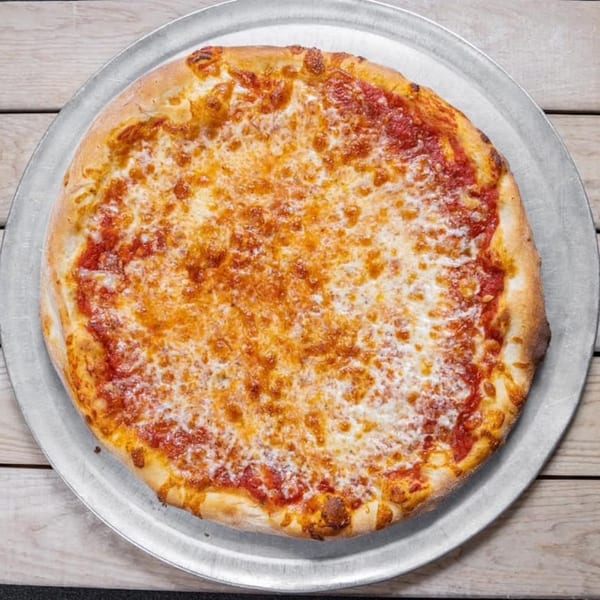 A classic cheese pizza from Genova's Italian Restaurant & Pizza, with melted mozzarella and red sauce.